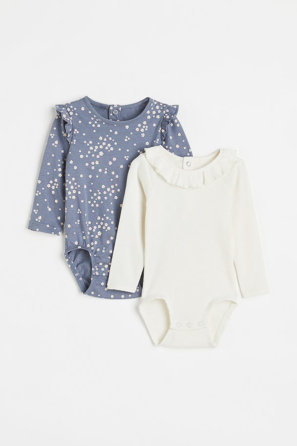 H&M 2er-Pack Bodys mit Puffärmeln Taubenblau/Geblümt