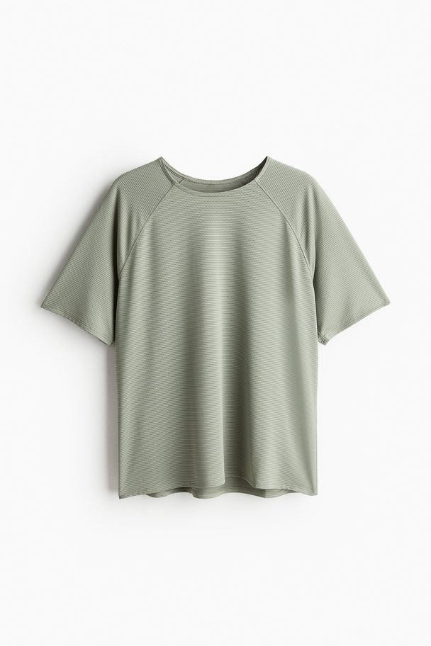 H&M DryMove™ Sport-T-Shirt aus Mesh Helles Khakigrün