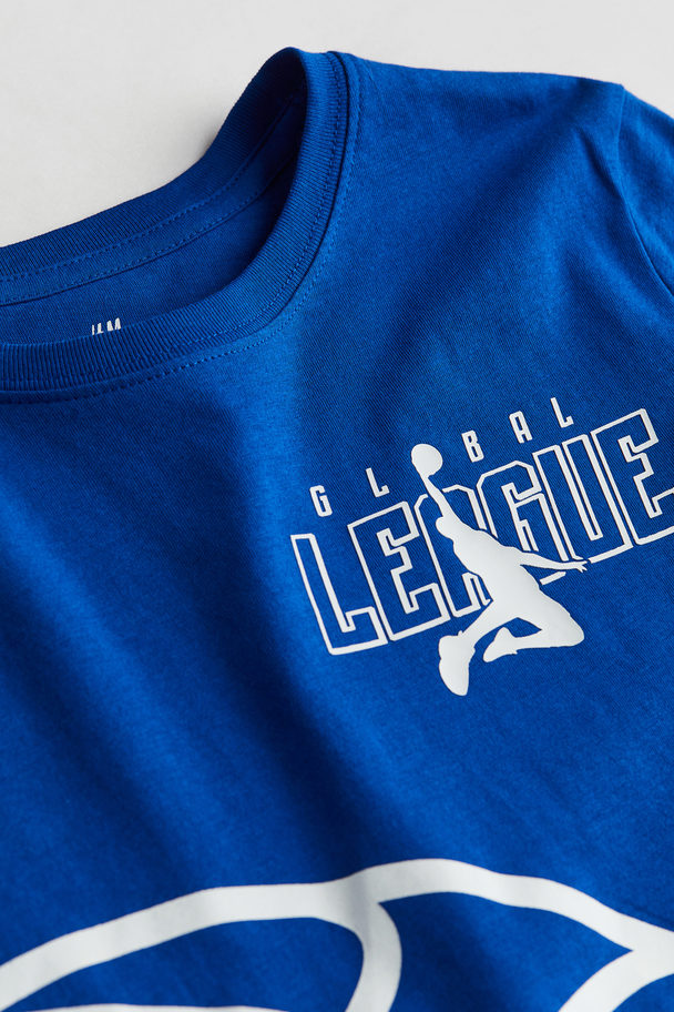 H&M T-Shirt mit Print Blau/Basketball