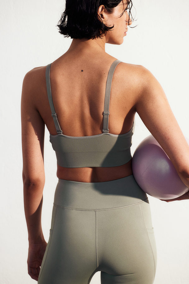 H&M Seamless Sport-BH Medium Support Helles Khakigrün