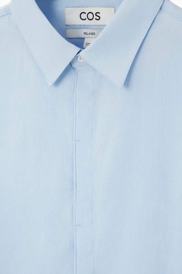 COS Skjorta Med Dold Knappslå – Avslappnad Blå