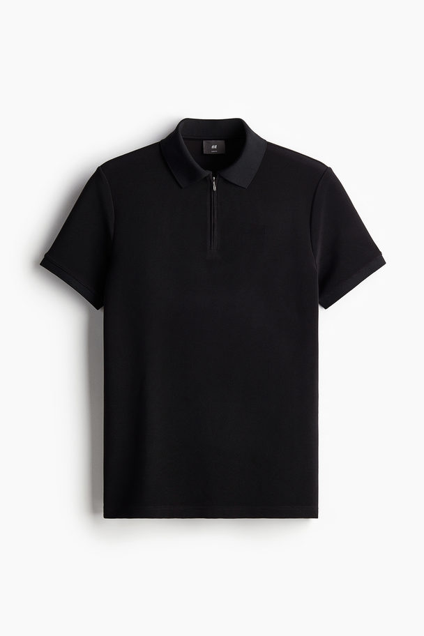 H&M Poloshirt mit Zipper in Slim Fit Schwarz