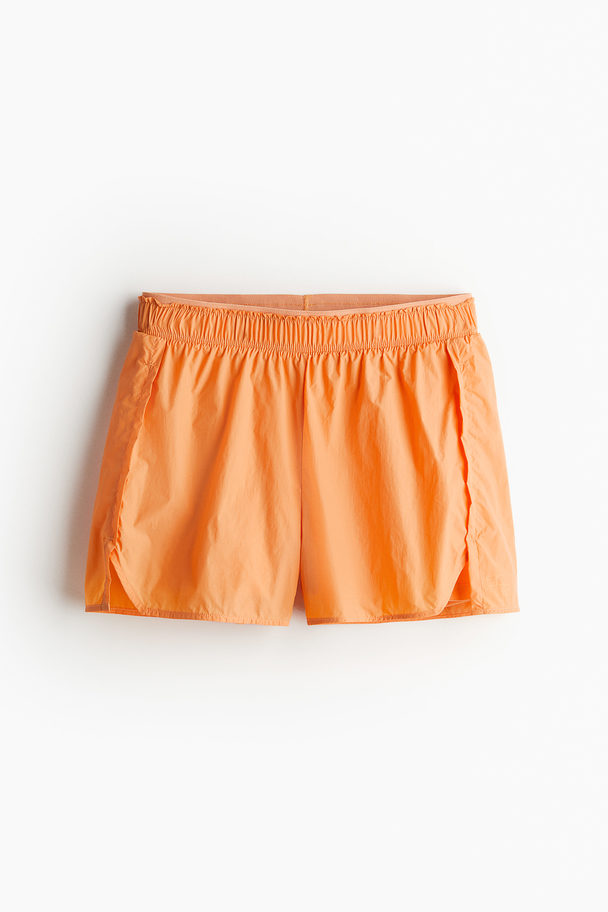 H&M DryMove™ Laufshorts Orange