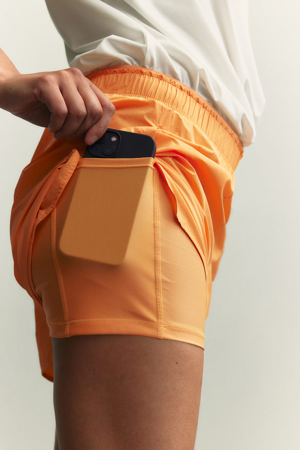 H&M DryMove™ Laufshorts Orange