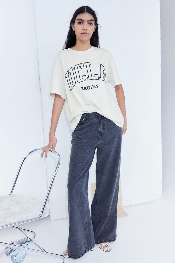 H&M Oversize-T-Shirt mit Druck Cremefarben/UCLA