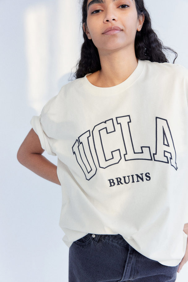 H&M Oversize-T-Shirt mit Druck Cremefarben/UCLA