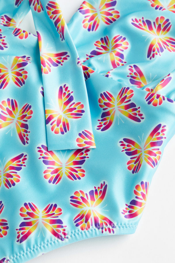 H&M Neckholder-Badeanzug mit hohem Beinausschnitt Türkis/Schmetterlinge