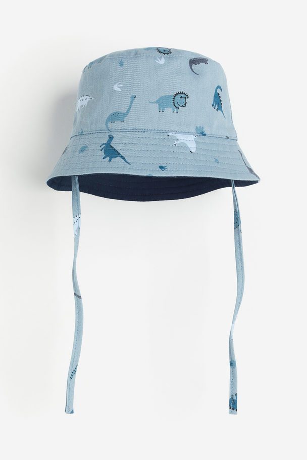 H&M Wendbarer Bucket Hat Blau/Dinosaurier