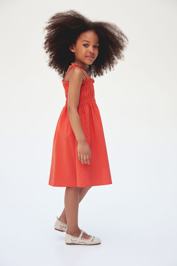 H&M Kleid mit gesmoktem Oberteil Orange