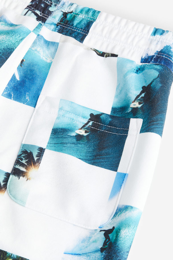 H&M Sweatshort Met Dessin Lichtblauw/surfer