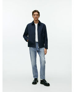 Avslappet Coast-jeans Med Avsmalnende Ben Vasket Blå
