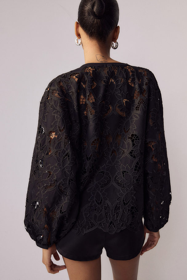 H&M Bluse mit Broderie Anglaise Schwarz