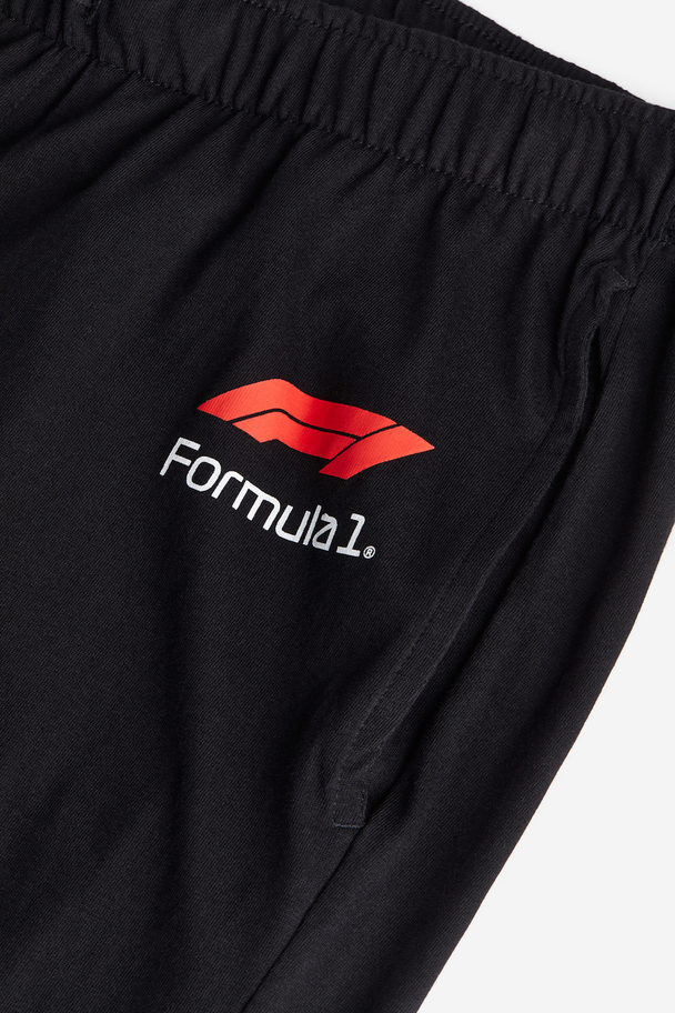 H&M Schlafhose Regular Fit Schwarz/Formula 1