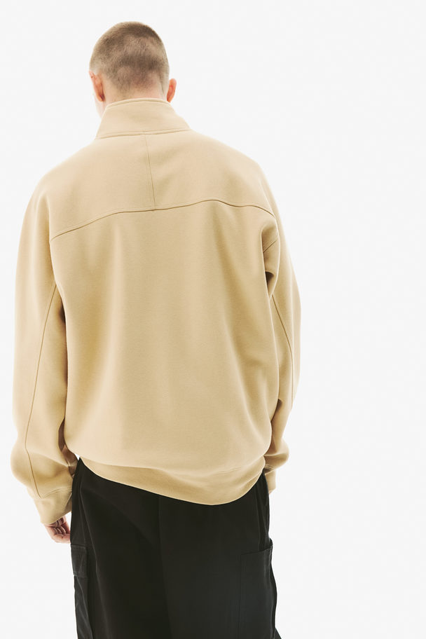 H&M THERMOLITE® Sweatshirt mit Zipper in Loose Fit Hellbeige