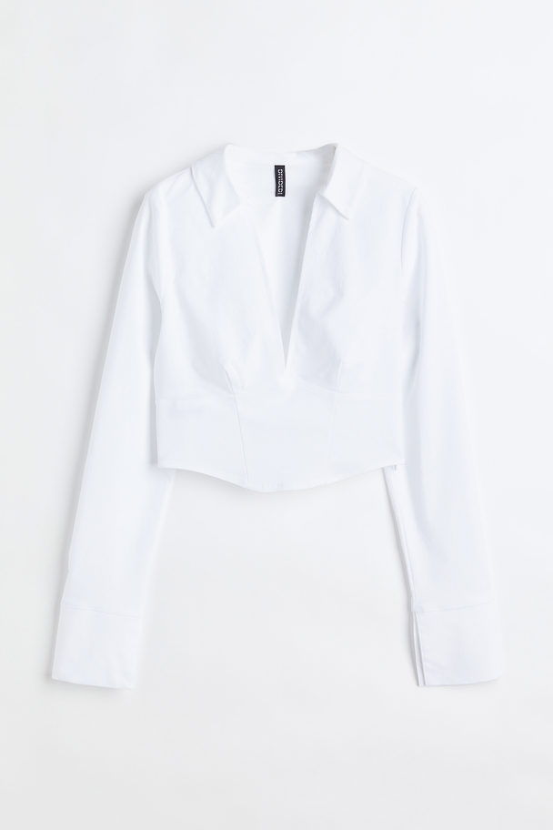H&M Bluse mit V-Ausschnitt im Korsagen-Look Weiß