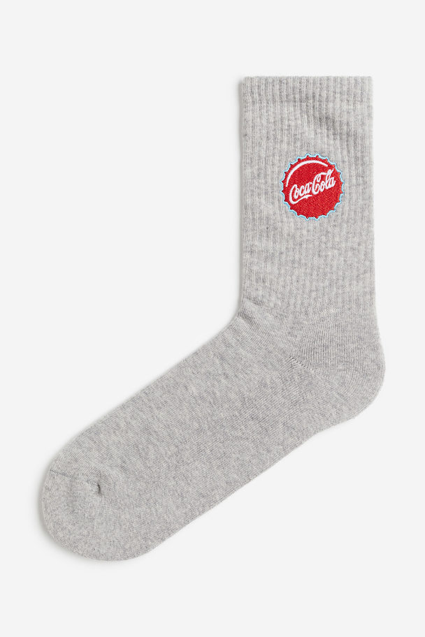 H&M Socken mit Motiv Graumeliert/Coca-Cola