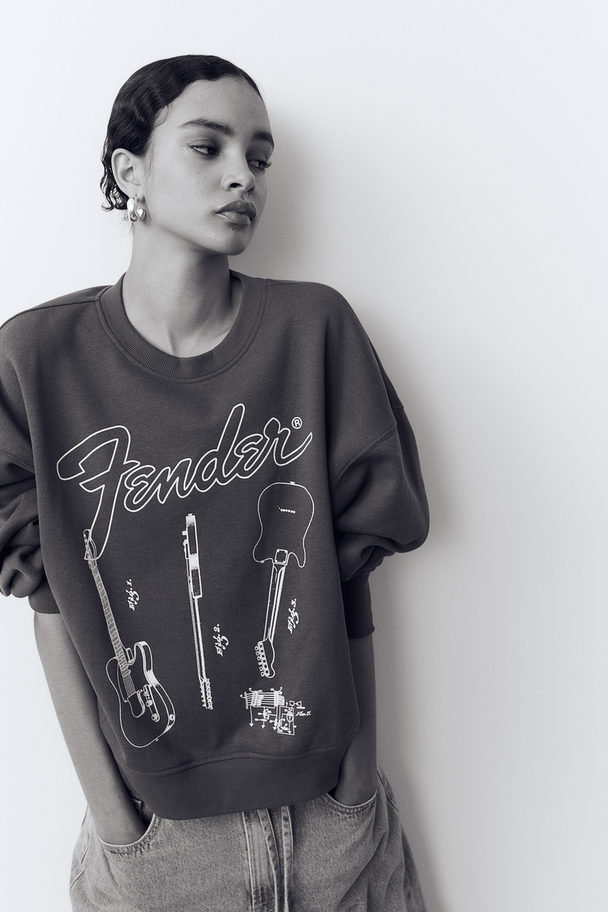 H&M Sweatshirt mit Print Dunkelgrau/Fender