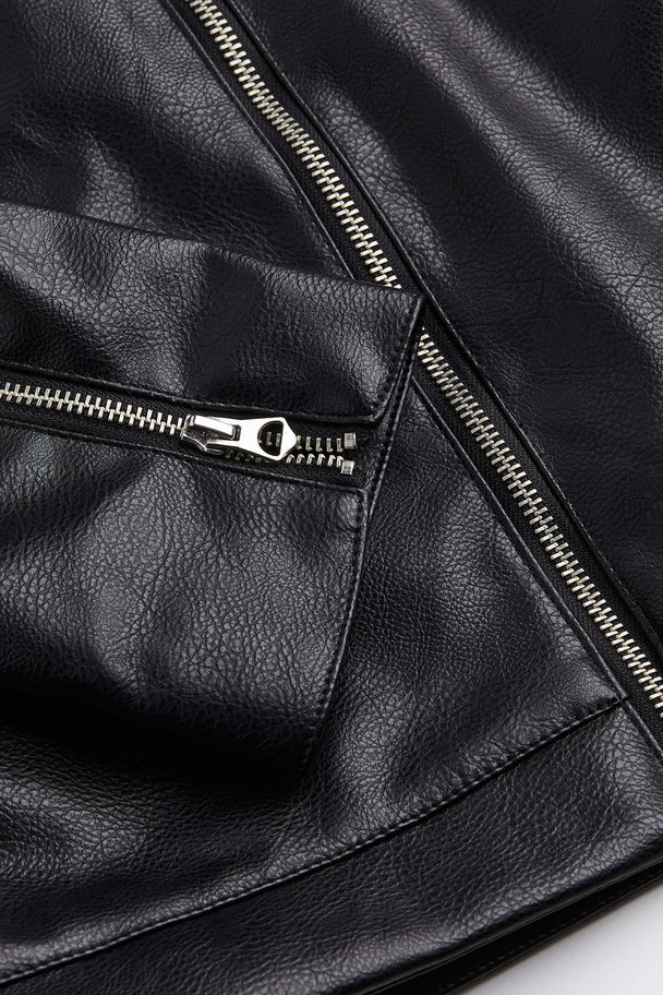 H&M Jacke mit flauschigem Kragen Schwarz
