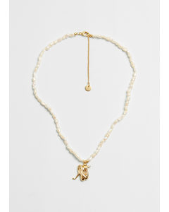 Halskette mit Perlmuttanhänger Perlen/Gold