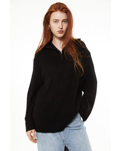 Oversized Pullover mit kurzem Reißverschluss Schwarz