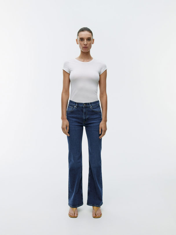 ARKET Stretch-Jeans mit ausgestelltem Bein Dunkelblau