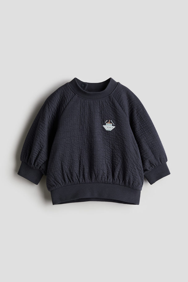 H&M Sweatshirt mit Stickerei Marineblau/Boot