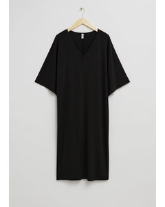 Lockeres Kleid mit Kimonoärmeln Schwarz