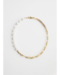 Halskette aus zweierlei Ketten mit Perlen Gold