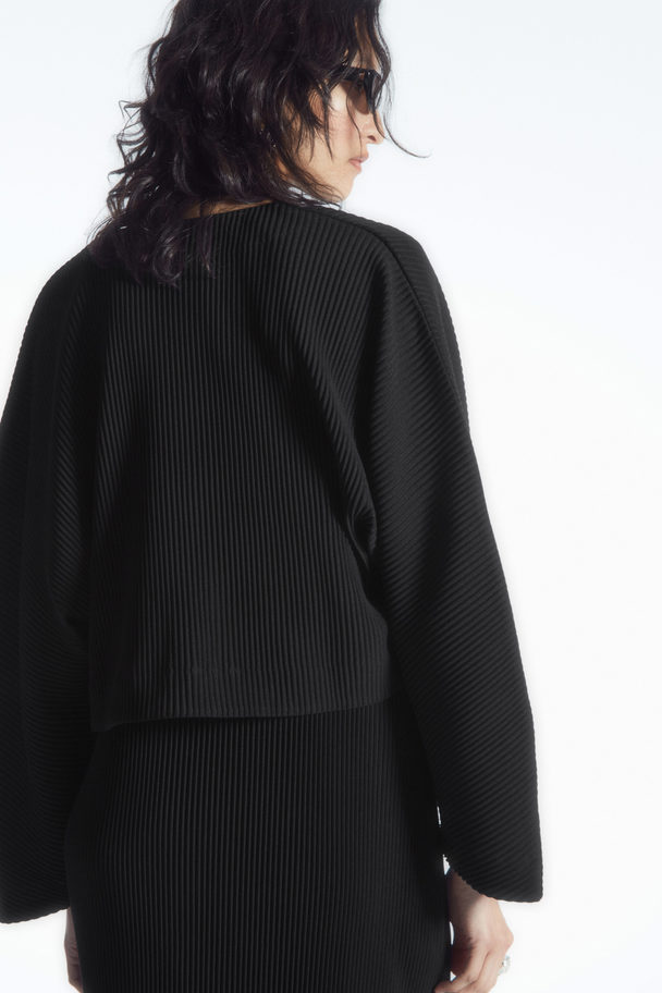 COS BOLERO-JACKE MIT PLISSEEFALTEN SCHWARZ