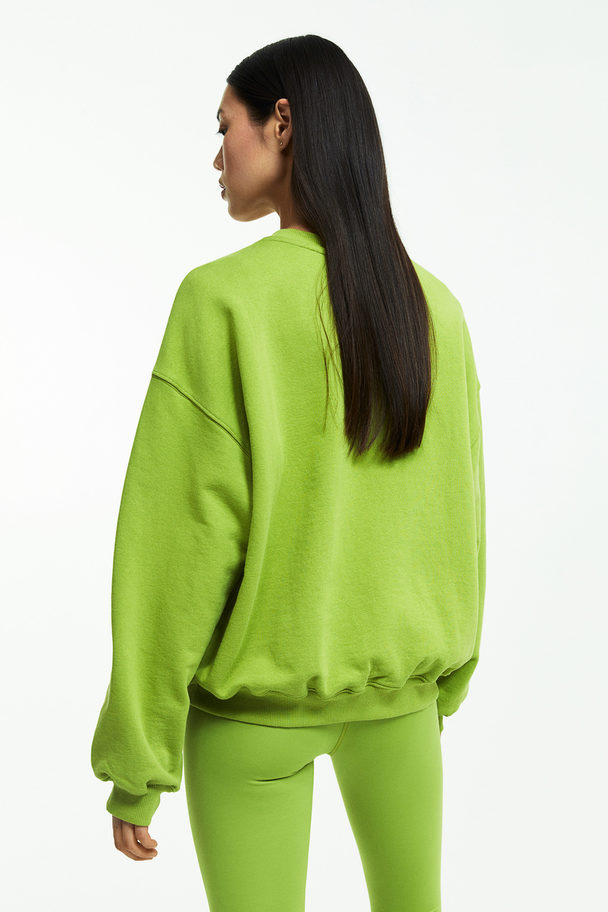H&M Oversized Sportsweater Limegroen