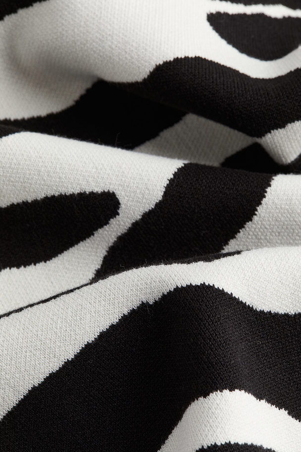 H&M Kleid aus Jacquardstrick Schwarz/Zebraprint