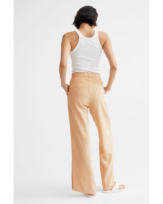 H&M Wide Side-slit Trousers Light Yellow