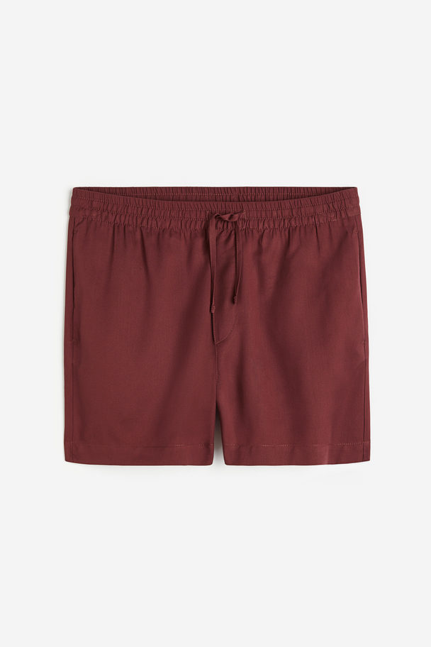 H&M Shorts aus Lyocell Regular Fit Weinrot
