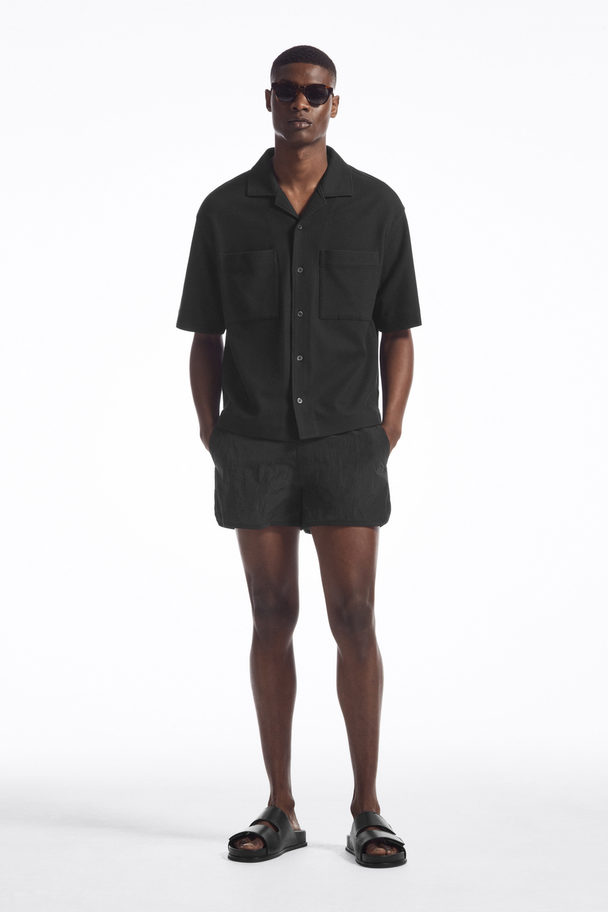 COS FALTBARE BADESHORTS NAVYBLAU