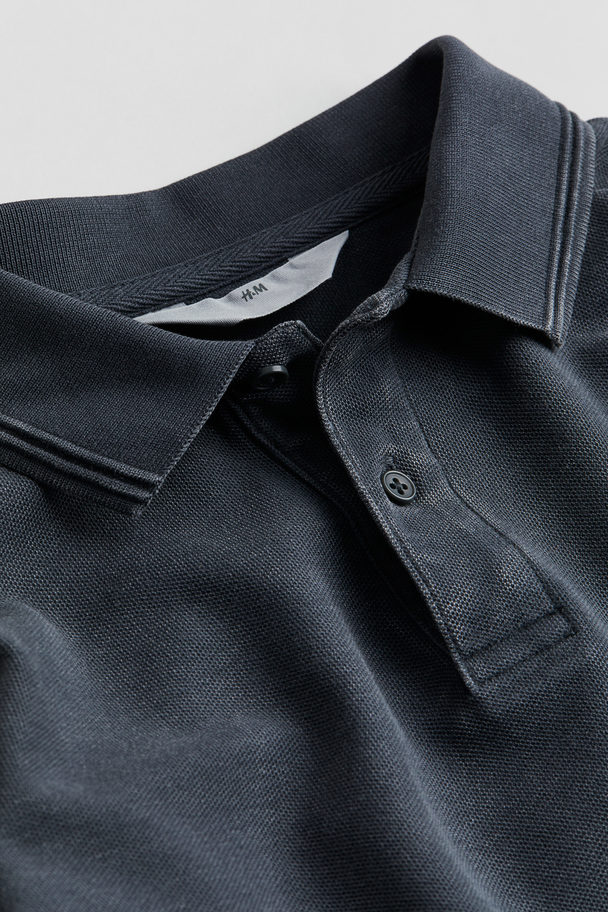 H&M Langarm-Poloshirt aus Baumwollpikee Ausgewaschenes Schwarz