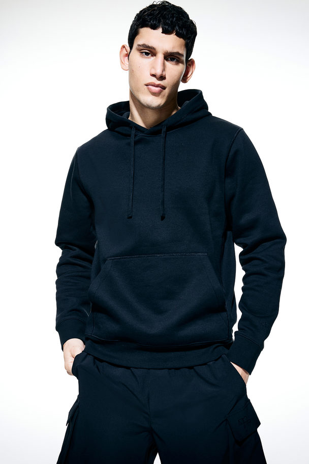 H&M Sportsweater Van Drymove™ - Regular Fit Zwart