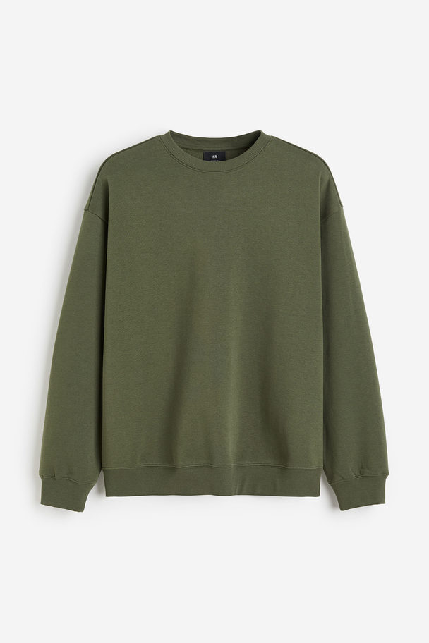 H&M Sweatshirt in Loose Fit Dunkles Khakigrün