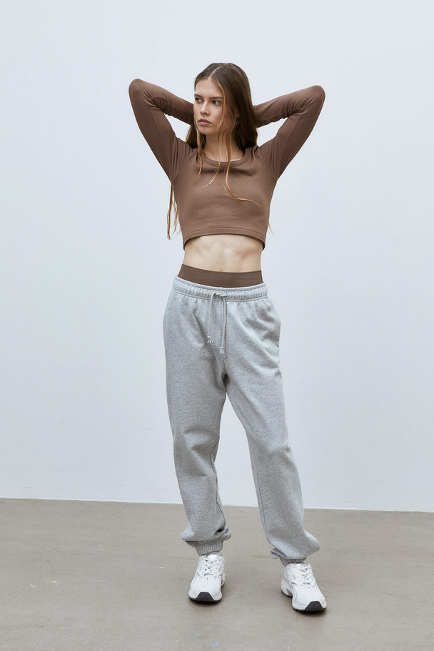 H&M Drymove™ Seamless Cropped Sports Top Brown