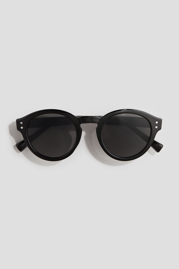 H&M Ovale Sonnenbrille Schwarz