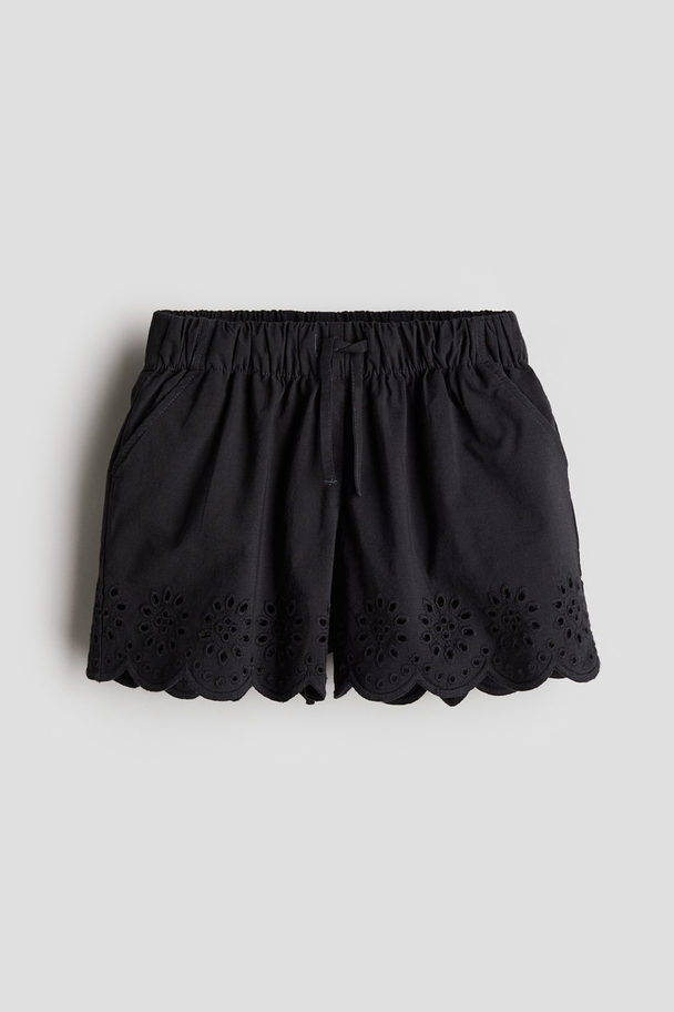 H&M Shorts mit Broderie Anglaise Dunkelgrau