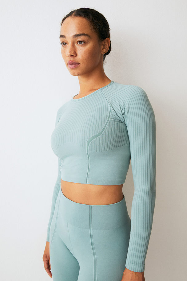 H&M Drymove™ Seamless Cropped Sports Top Light Teal