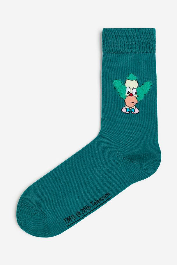 H&M Socken Türkis/Die Simpsons