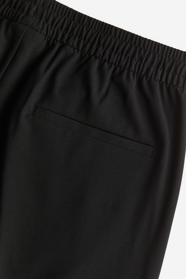 H&M Joggpants in Slim Fit Schwarz