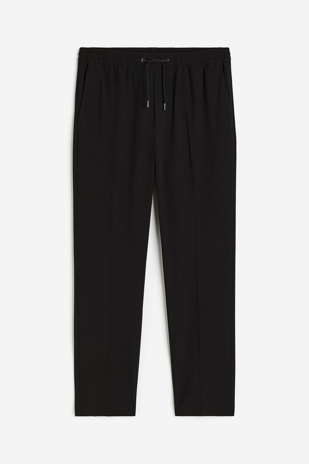 H&M Joggpants in Slim Fit Schwarz