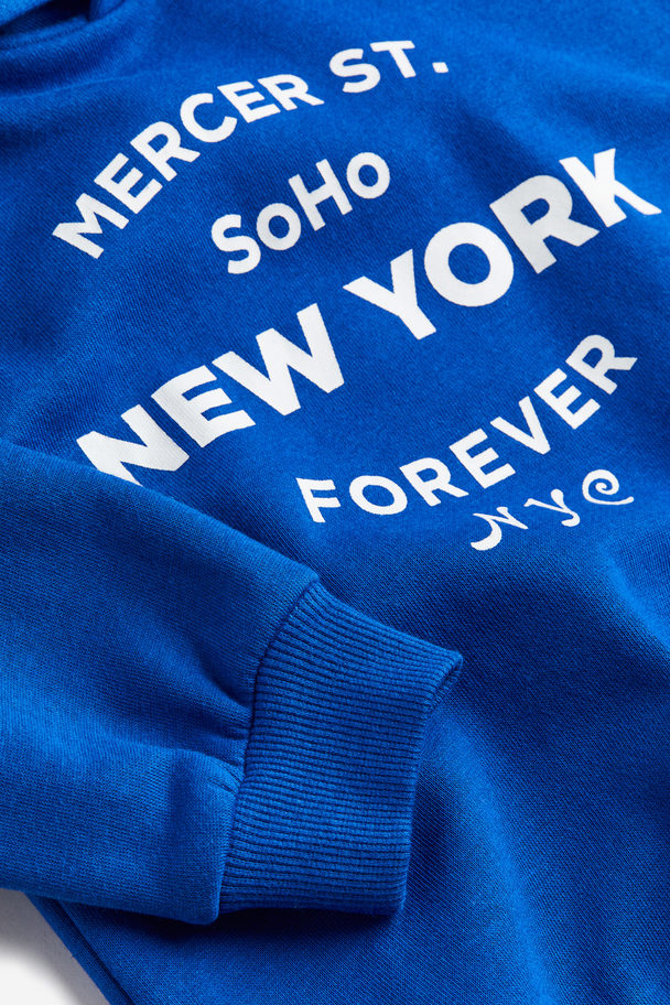 H&M Capuchonsweater Met Print Helderblauw/new York