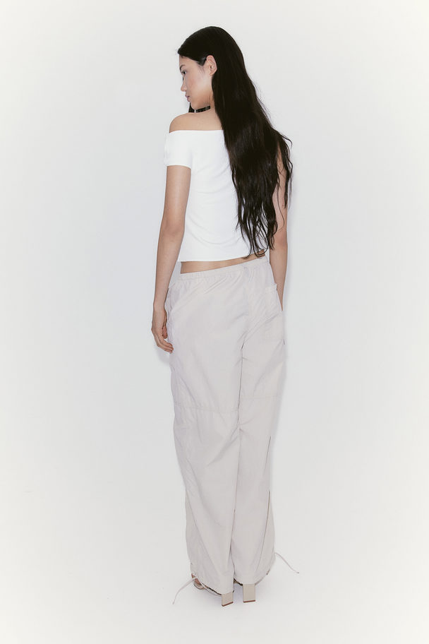 H&M One-Shoulder-Shirt mit Twistdetail Weiß