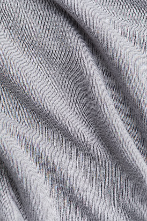 H&M One-Shoulder-Shirt mit Twistdetail Grau