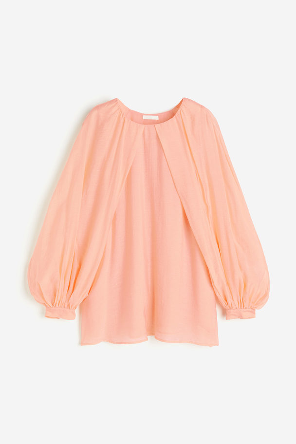 H&M Voluminöse Bluse Pfirsichrosa