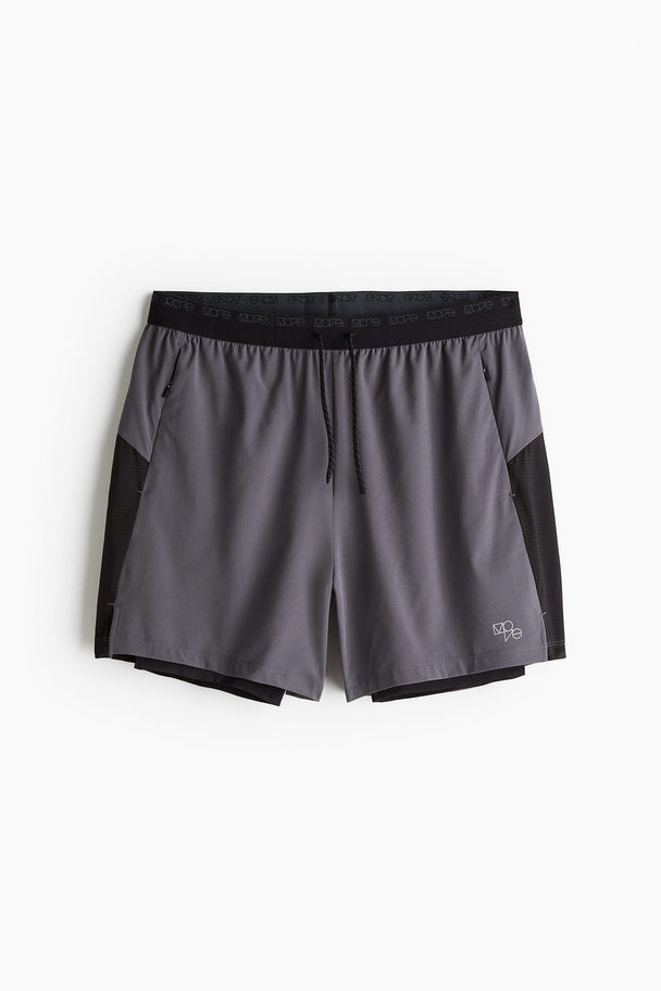 H&M DryMove™ Doppellagige Laufshorts Grau