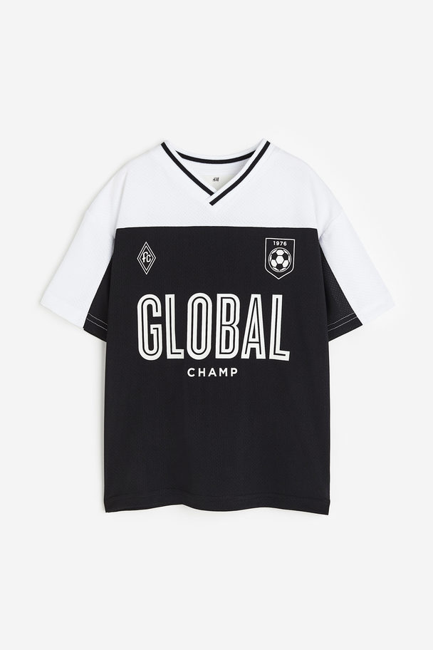 H&M T-Shirt aus Mesh Schwarz/Global Champ